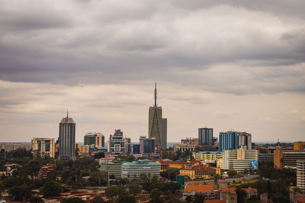 Two movers carrying furniture into a home in Kilimani, Kenya.