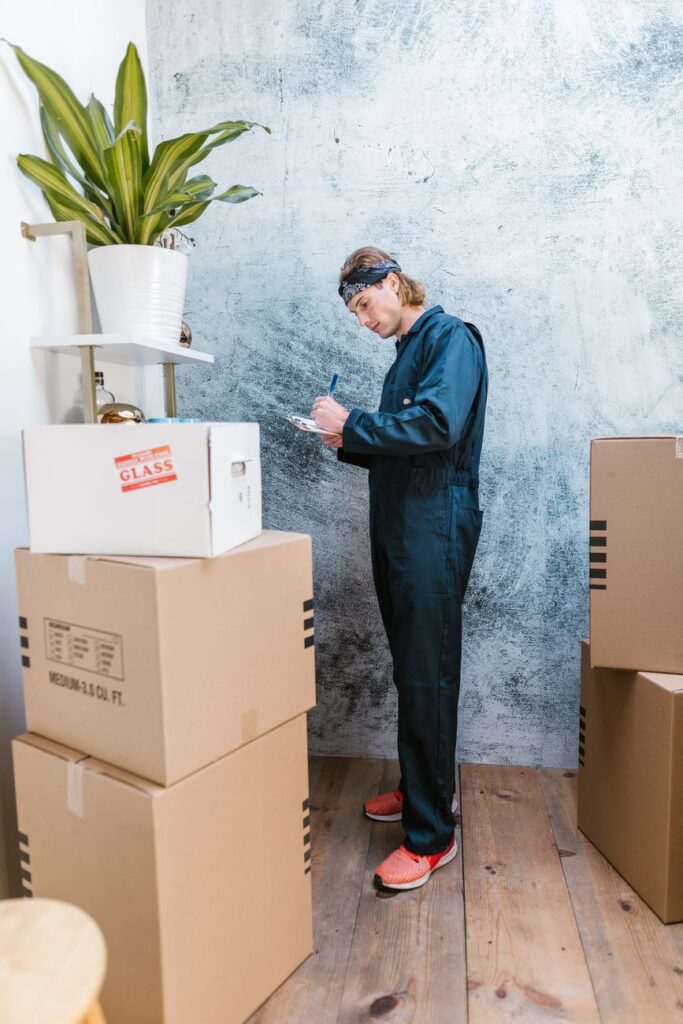 Professional movers loading furniture into a truck for a house or office relocation in Nairobi, Kenya.