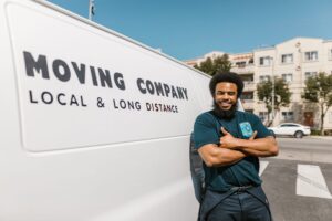Professional movers in Nairobi, Kenya, carefully packing boxes for reliable moving services.