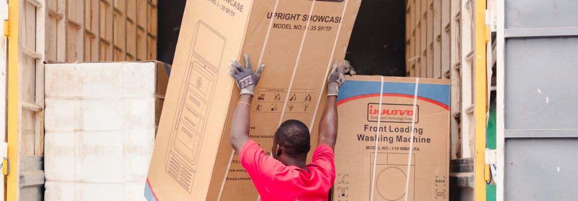 Professional moving team loading a truck with furniture boxes in Syokimau, contact Goodlife Movers at 0729839701.