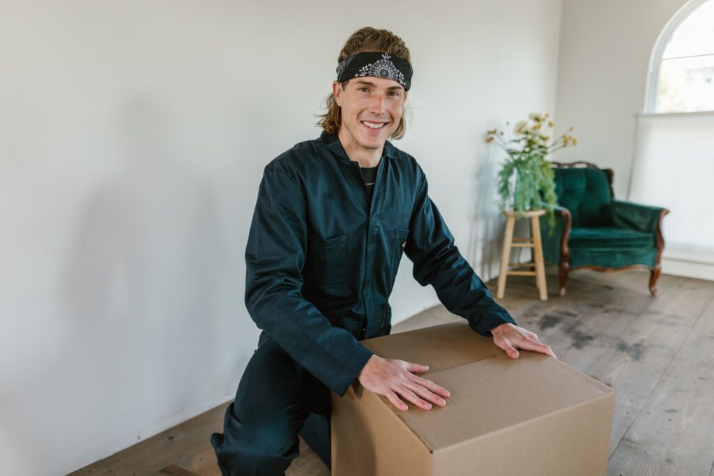 Professional residential house movers in Nairobi loading furniture into a moving truck.